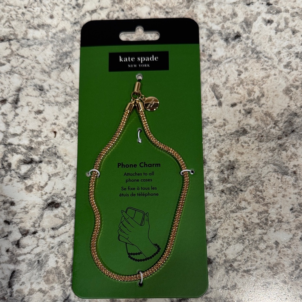 Kate Spade Gold Phone Accessory